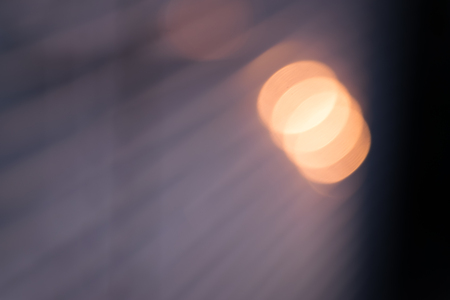 Sun shining through the blinds. Blured background.の写真素材