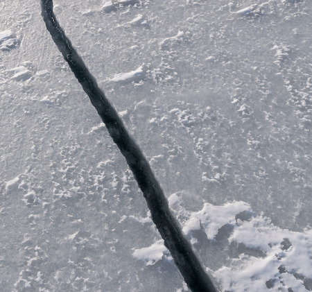 Big crack on the frozen sea.の写真素材