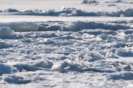 Frozen sea view on sunny day.