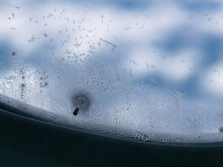 Ice on the window glass.の写真素材