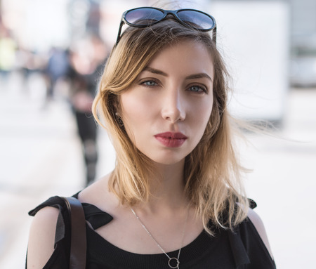 Portrait of beautiful sensual woman with blue eyes.の写真素材