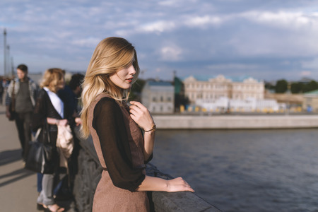 Outdoors portrait of beautiful young woman. Selective focus.の写真素材
