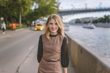 Outdoors portrait of beautiful young woman. Selective focus.の写真素材