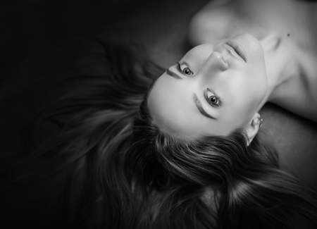 Black and white portrait of a beautiful young woman.の写真素材