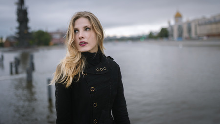 Outdoors portrait of beautiful young woman. Selective focus.の写真素材