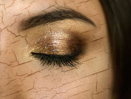 Woman with cracked on face as cosmetic and dehydration effect concept.の写真素材