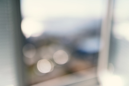 Blurred view at city from window.の写真素材