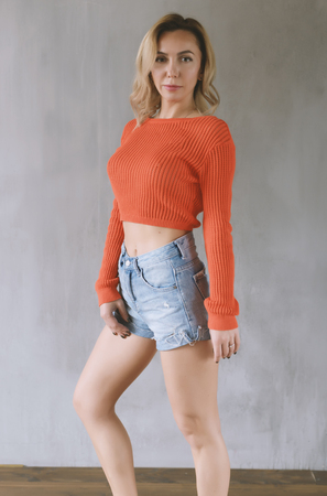 Portrait of beautiful sensual woman in shorts.の写真素材