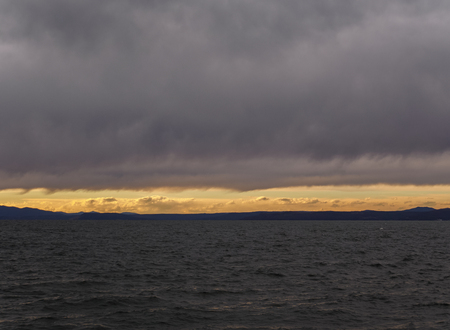 Beautiful sunset with clouds and sea.の写真素材