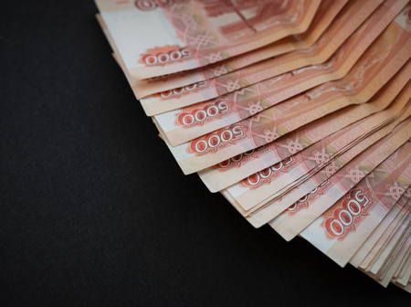 Five-thousandth banknotes on a dark background.の写真素材