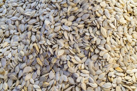 Food in a supermarket - dried pumpkin seeds.の写真素材