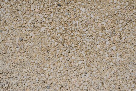 Wall with small stones. Seamless texture.の写真素材