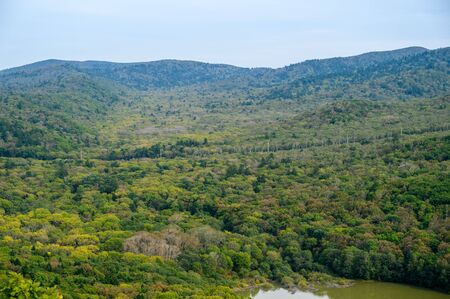 Landscape with green hills and river.の写真素材