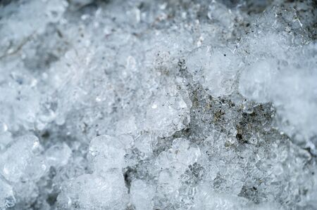 Small ice crystals at spring. Selective focus and shallow depth of field.の写真素材
