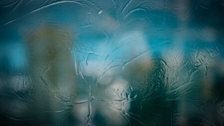 Frozen glass - natural winter background.の写真素材