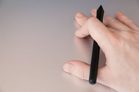 Graphic designer using digital tablet. Selective focus on stylus.の写真素材