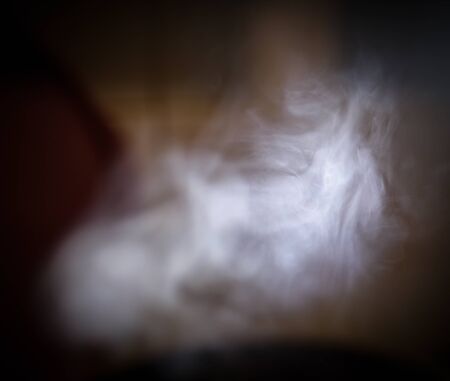 Steam over the pan. Selective focus.の写真素材