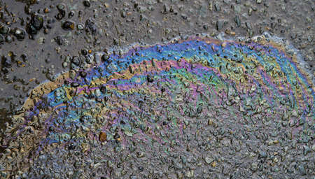 Gasoline flows on the pavement.