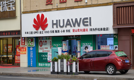 MISHAN, CHINA - JULY 28, 2019: Huawei logo at store. Huawei is a Chinese multinational technology company.のeditorial素材