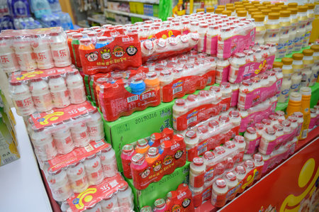 MISHAN, CHINA - JULY 28, 2019: Various drinks at chinese shop. Selective focus.のeditorial素材
