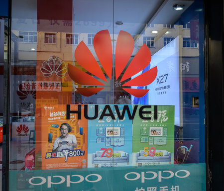 MISHAN, CHINA - JULY 28, 2019: Huawei logo at store. Huawei is a Chinese multinational technology company.のeditorial素材