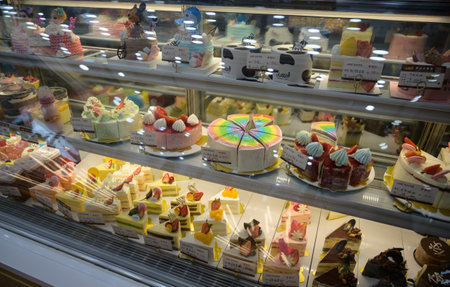 MISHAN, CHINA - JULY 28, 2019: Various baked products at chinese shop. Selective focus.のeditorial素材