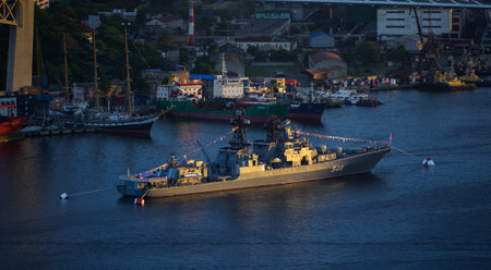 VLADIVOSTOK, RUSSIA - JULY 26, 2020: The parade of warships during the celebration of the day of the navy at night.のeditorial素材