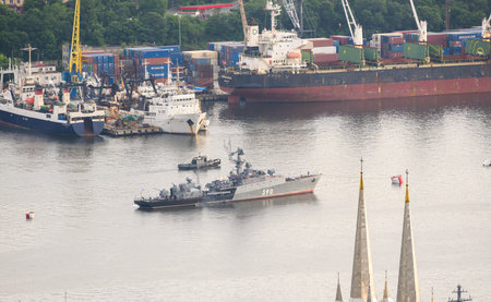 VLADIVOSTOK, RUSSIA - JULY 22, 2020: The parade of warships during the celebration of the day of the navy at night.のeditorial素材