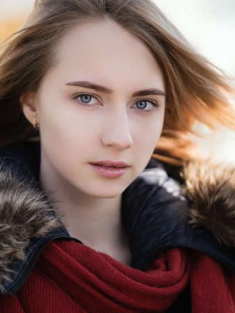 Portrait of a beautiful young woman with blue eyes.の写真素材