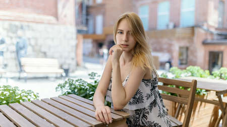 Outdoors portrait of beautiful young woman. Selective focus.の写真素材