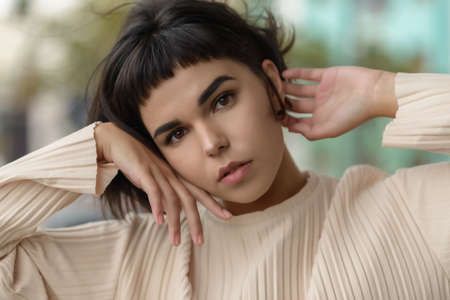 Portrait of beautiful sensual woman with brown eyes.