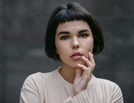 Portrait of beautiful sensual woman with brown eyes.の写真素材