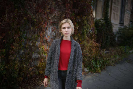 Outdoors portrait of beautiful young woman. Selective focus.の写真素材