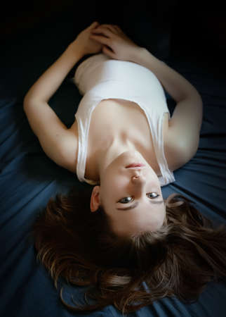 Portrait of a beautiful young woman with blue eyes.の写真素材