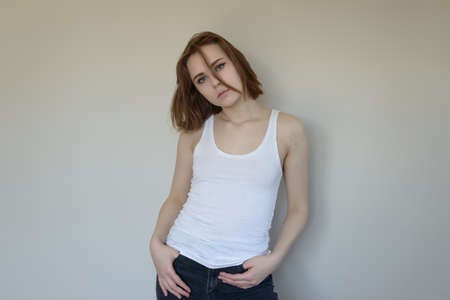 Portrait of a beautiful young woman with blue eyes.の写真素材