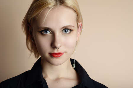 Portrait of beautiful young woman with blue eyes.の写真素材