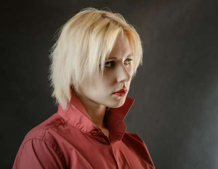 Portrait of a beautiful young woman with blue eyes.の写真素材