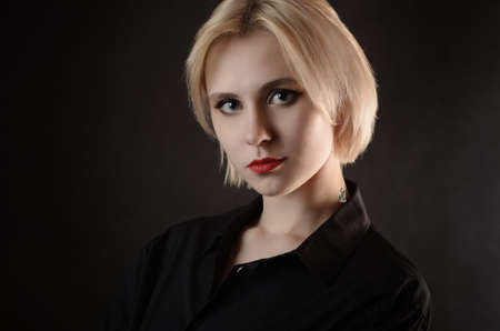 Portrait of a beautiful young woman with blue eyes.の写真素材