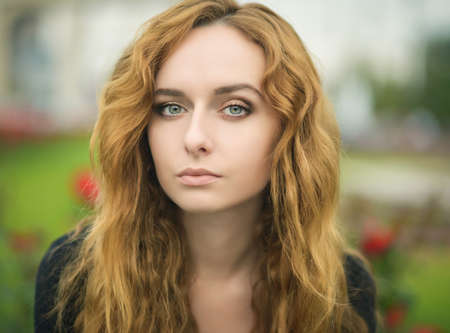 Portrait of attractive young woman with blue eyes.の写真素材