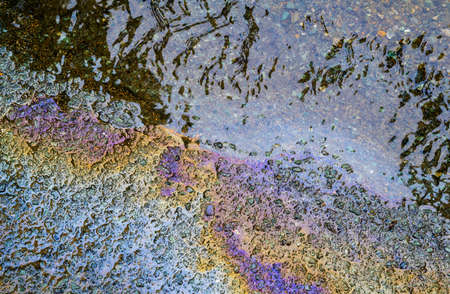 Gasoline flows on the pavement.