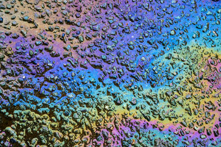 Gasoline flows on the pavement.の写真素材