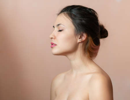 Portrait of a beautiful young brunette. Selective soft focus.の写真素材