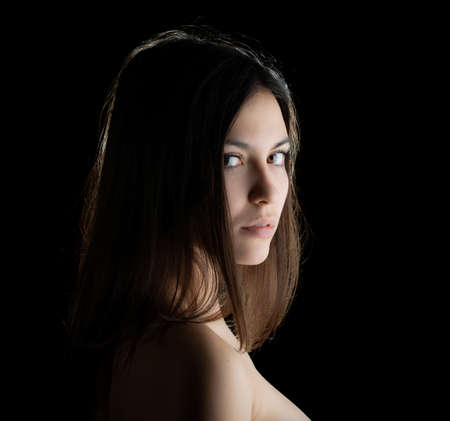Portrait of a beautiful young brunette. Selective soft focus.の写真素材