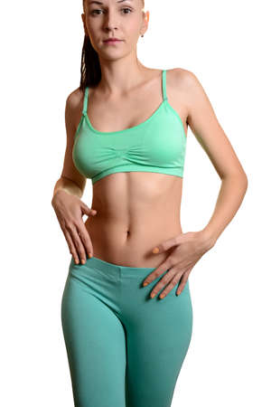 Fitness female woman isolated on white.の写真素材