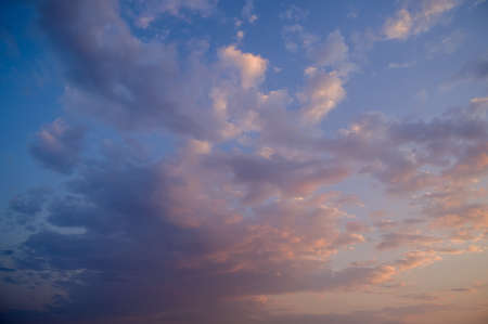 Beautiful colorful sky with clouds and sunlight. Color toned.の写真素材