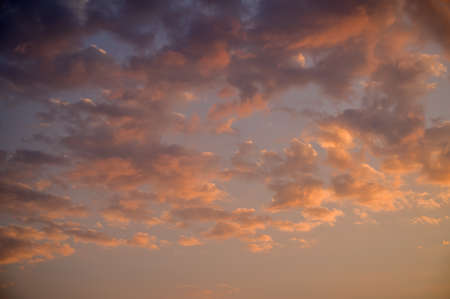 Beautiful colorful sky with clouds and sunlight. Color toned.の写真素材