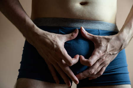 Young man in boxer underpants. Selective focus.の写真素材