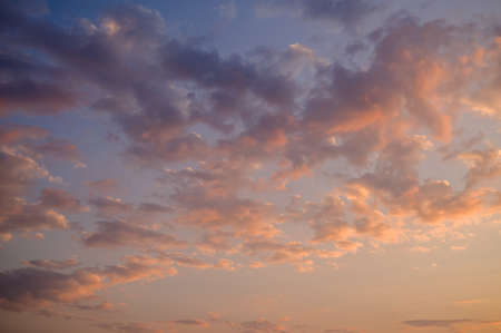 Dramatic sunset sky with colored clouds. Toned image.の写真素材
