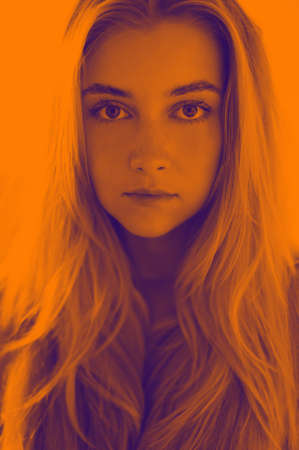 Portrait of young woman - duo tone effect.