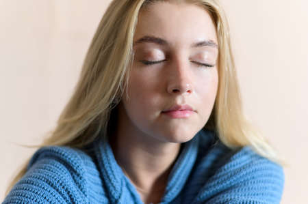 Portrait of beautiful sensual woman with blue eyes. Studio shot.の写真素材